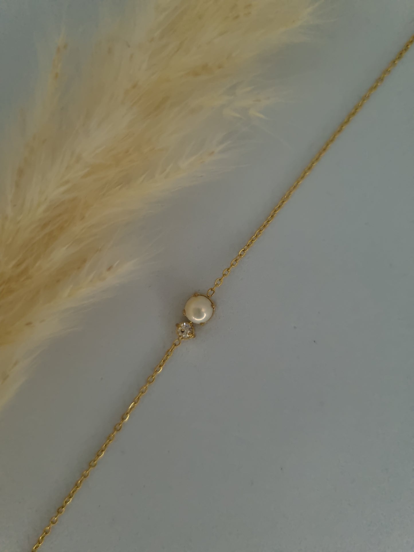 ECLAT - petite perle en résine blanche et cristal taillé