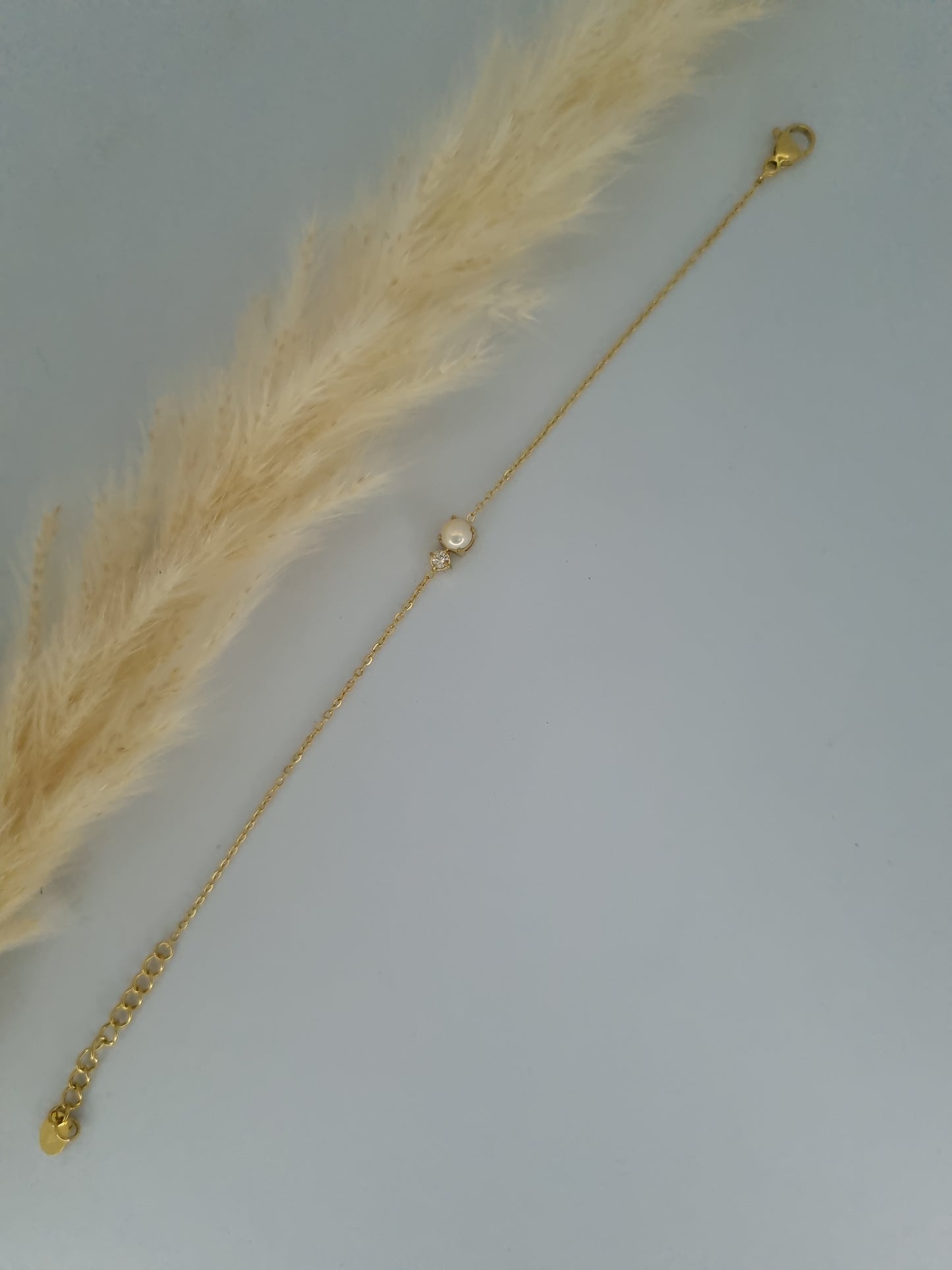 ECLAT - petite perle en résine blanche et cristal taillé